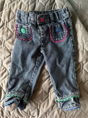 Baby girl jeans with colorful buttons